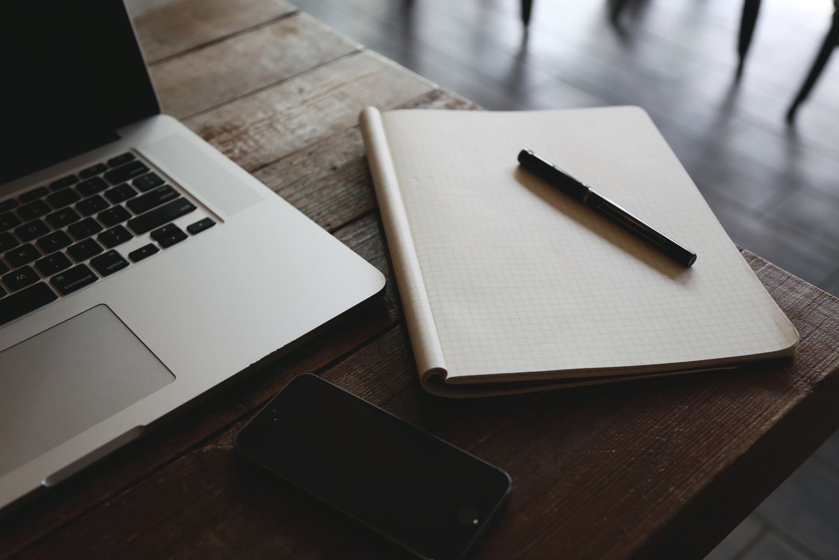 Wooden Table with Notebook